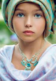 older girl wiht headress